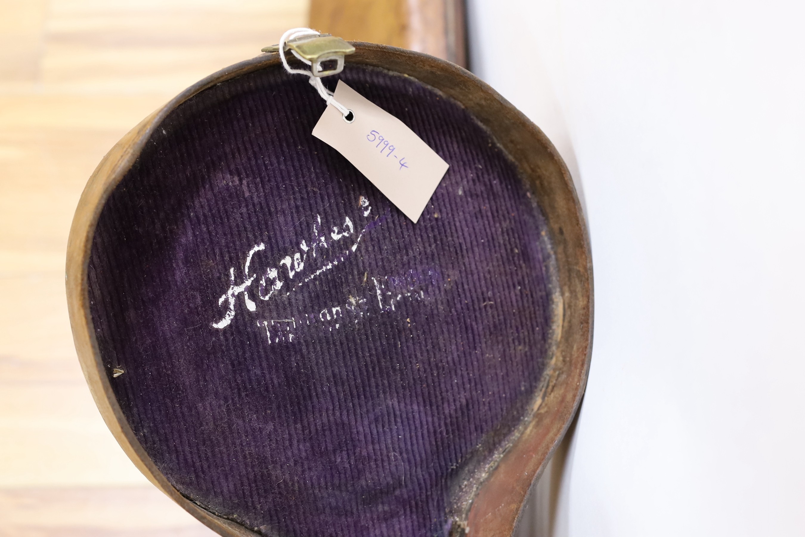A 19th century brown leather trombone case, 103cm long